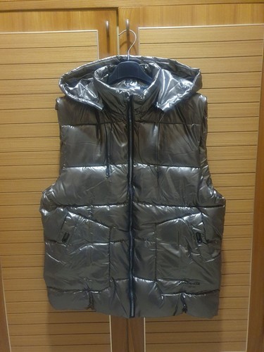 Piumino smanicato con